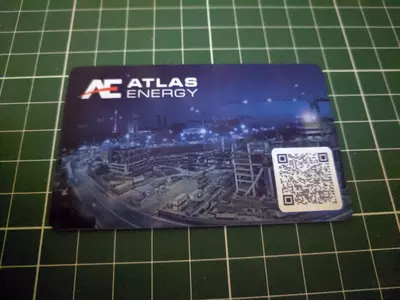 NFC визитка с QR кодом из пластика с индивидуальным дизайном для компании Атлас Энерджи