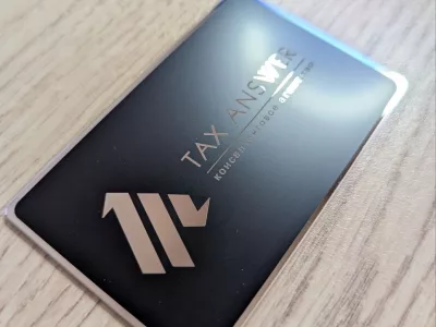 NFC визитка из стали с черным принтом для консалтингового агентства TAX ANSWER
